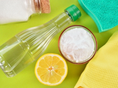 Eco-friendly natural cleaners. Vinegar, baking soda, salt, lemon and cloth. Homemade green cleaning.