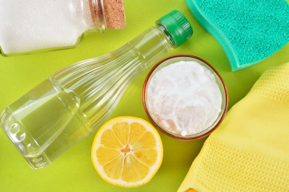 Eco-friendly natural cleaners. Vinegar, baking soda, salt, lemon and cloth. Homemade green cleaning.