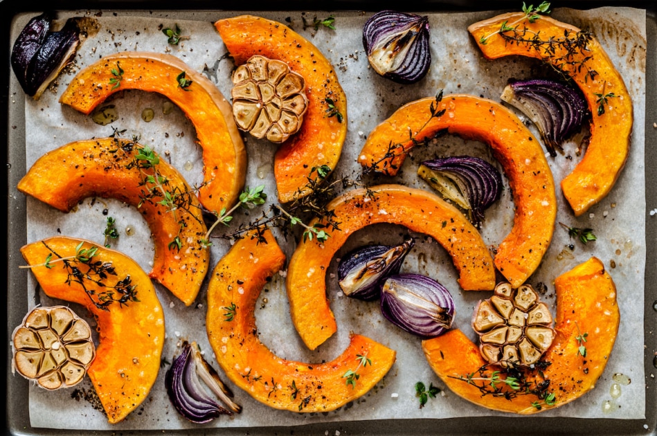 Roasted Butternut Squash Slices with Red Onions and Thyme, close up