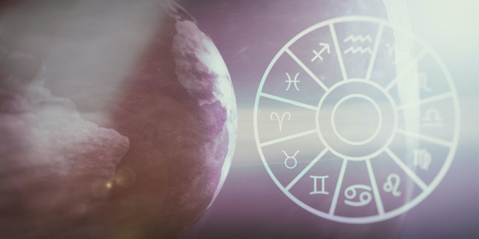 Astrology and horoscopes concept. Astrological zodiac signs wheel on earth and space background