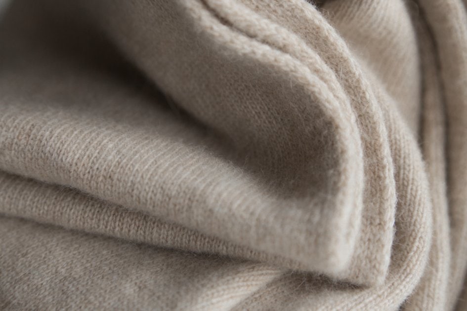 Folds of beige wool.