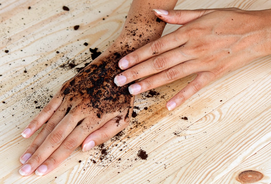 coffee hand scrub with ground coffee (wet) , mean to beauty or cosmetic.