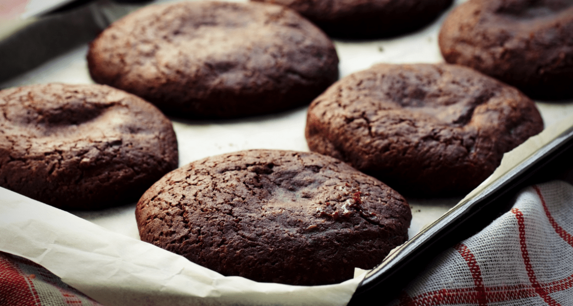 Chocolate cakes coming out of the oven.