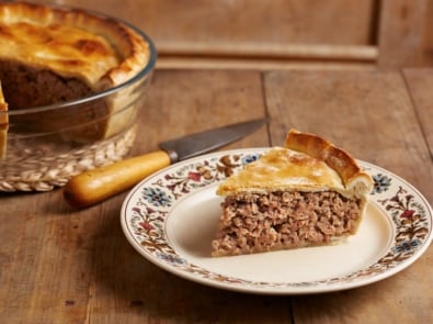 Traditional meat pie on a dish.