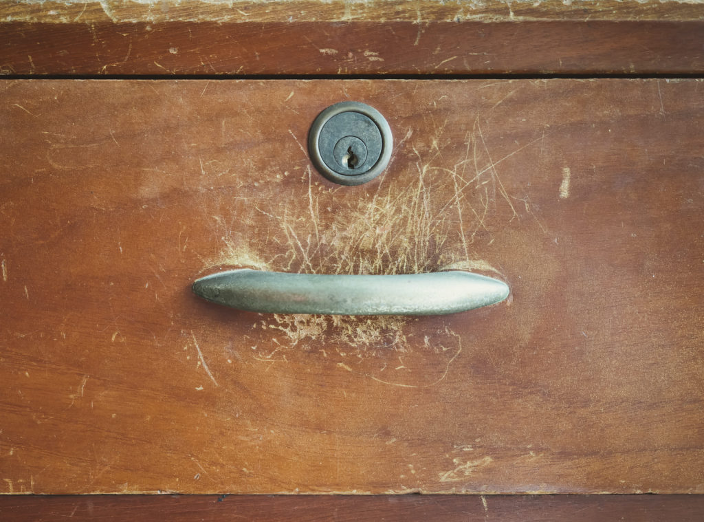 Wooden drawer with handle old furniture close up