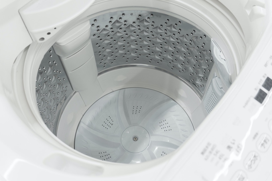 Inside look of a dried washing machine.