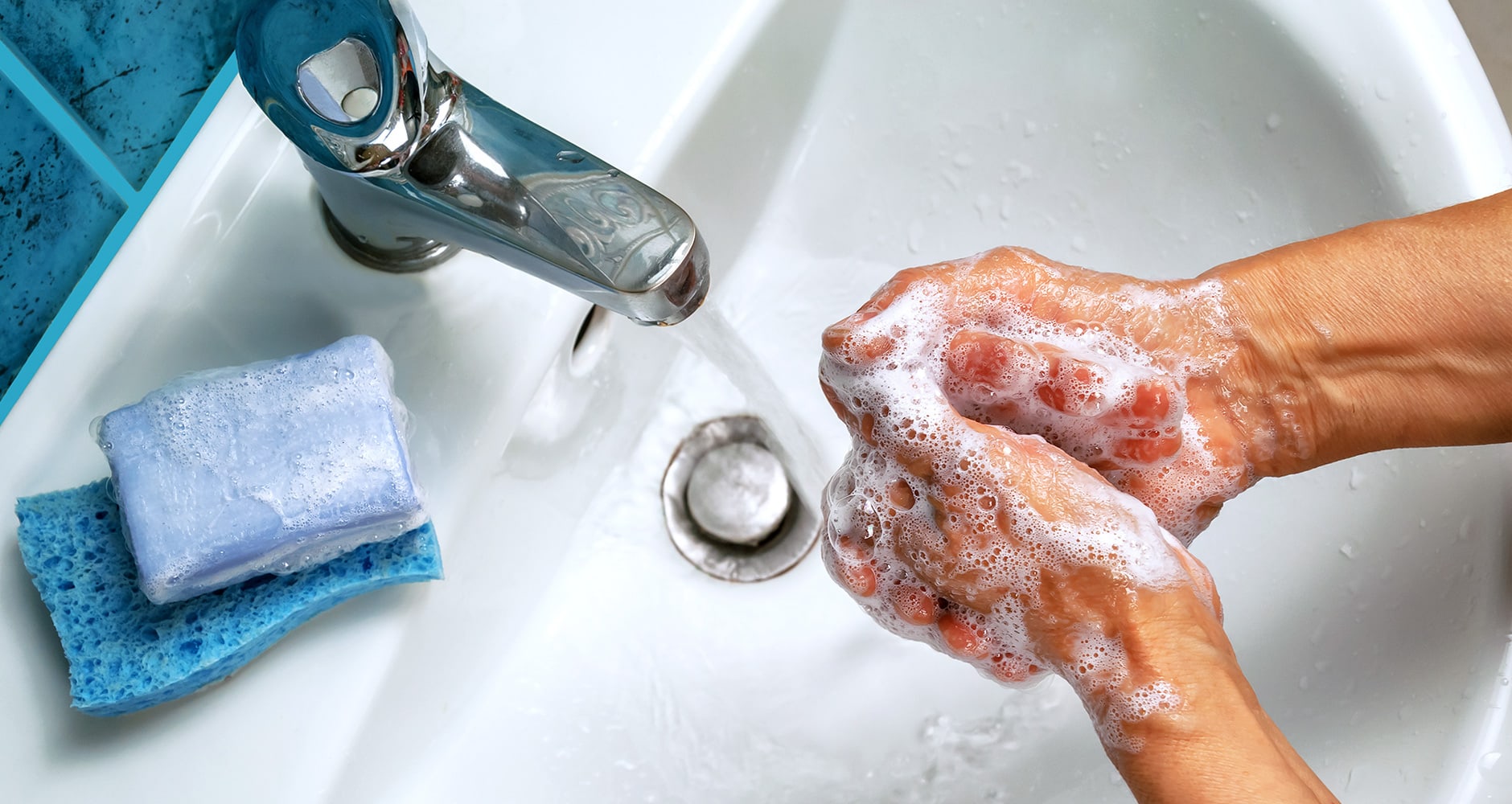 washing hands over sink with blue sponges next to faucet