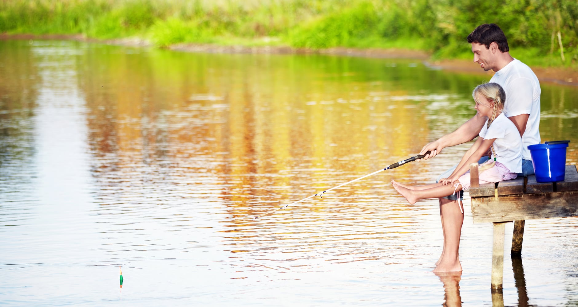 Memories of their fathers - girl fishing with father