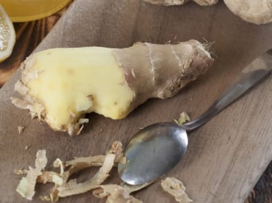 Ginger root on cutting board.