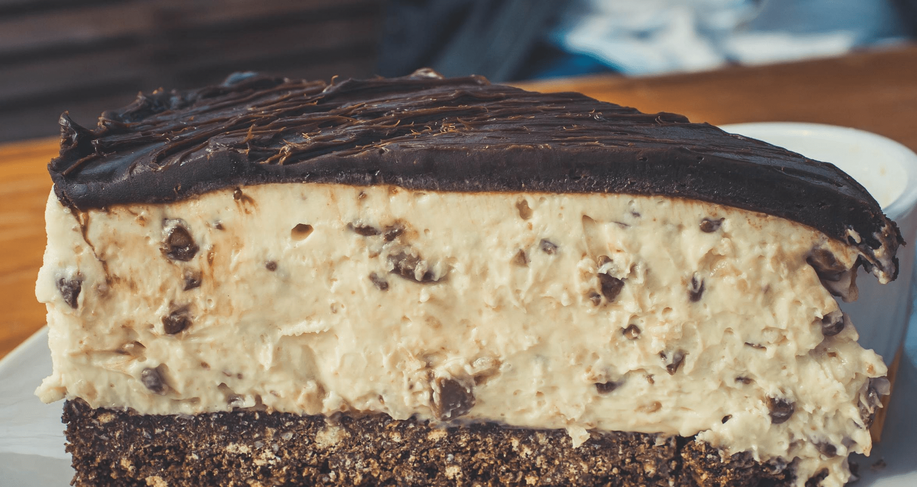 A peanut butter ice cream pie with a chocolate cookie crust, a favorite way to make your own ice cream pie.