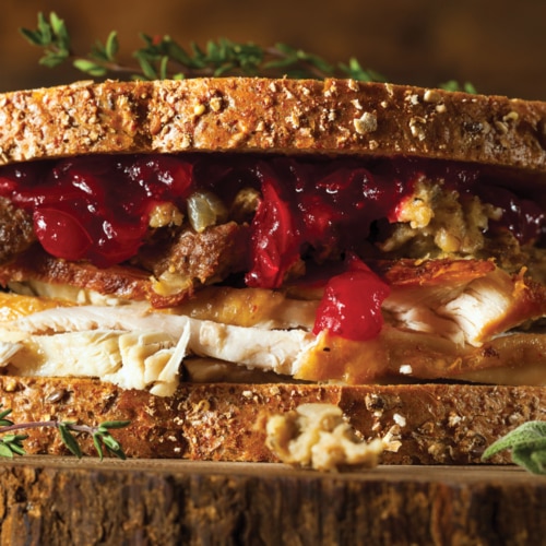 Thanksgiving leftovers in a delicious looking sandwich.