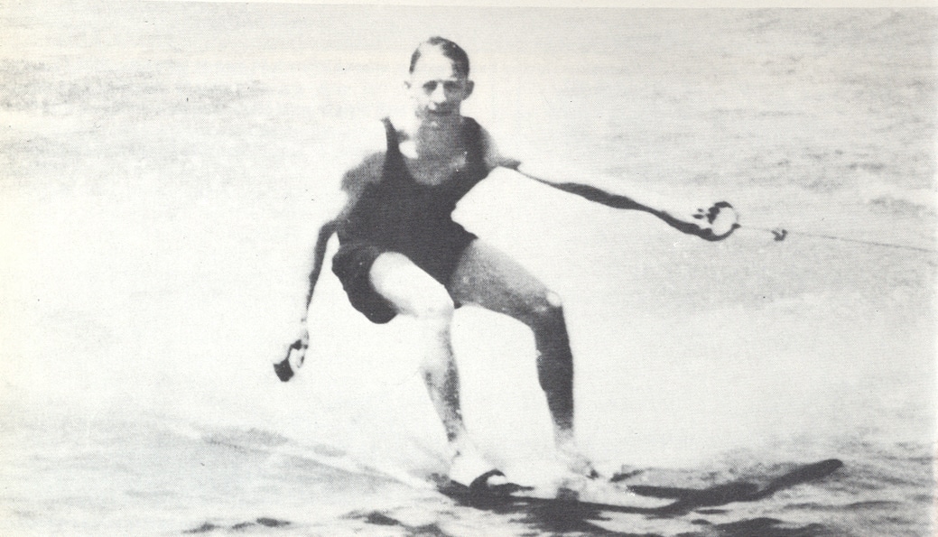 Ralph Samuelson waterskiing on the lake.