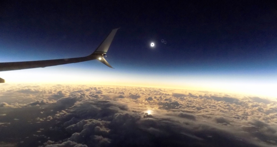 Solar eclipse of August 21, 2017 as seen from airplane window. - Earth