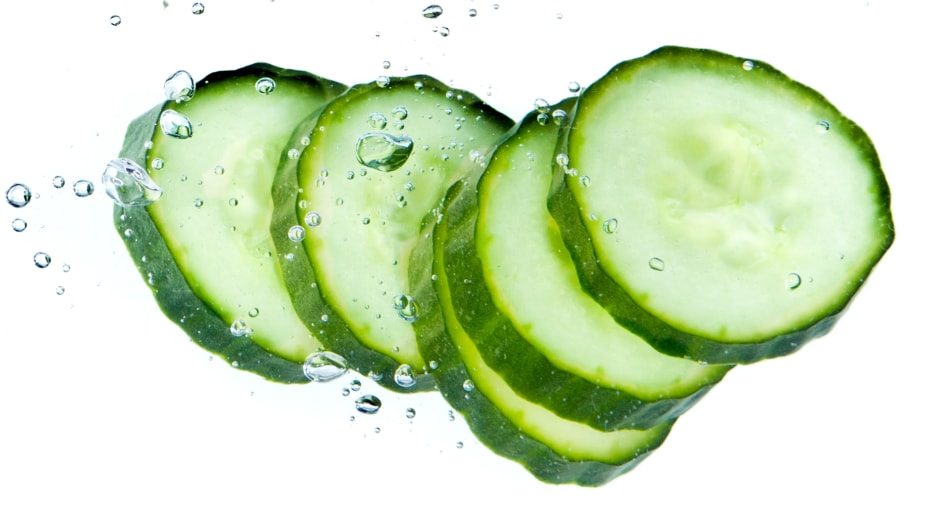 Cucumber slices floating in water