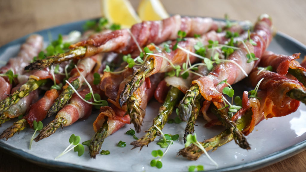 bacon wrapped asparagus on plate