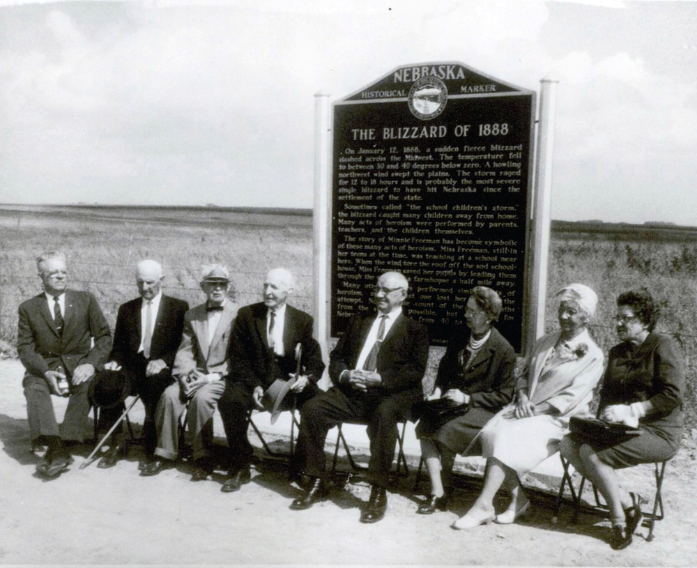 The 1888 Blizzard Club "In All It's Fury" Members of the Blizzard of 1888 pose at a historical marker in Valley County in 1967. From left, State Sen. H.C. Crandall of Curtis, Horace M. Davis of Lincoln, Oliver Bell (of Minnie Freeman's school), H. Greeley, Besse Davis, Ora Clement and Leslie Markel. 12_Blizzard1888