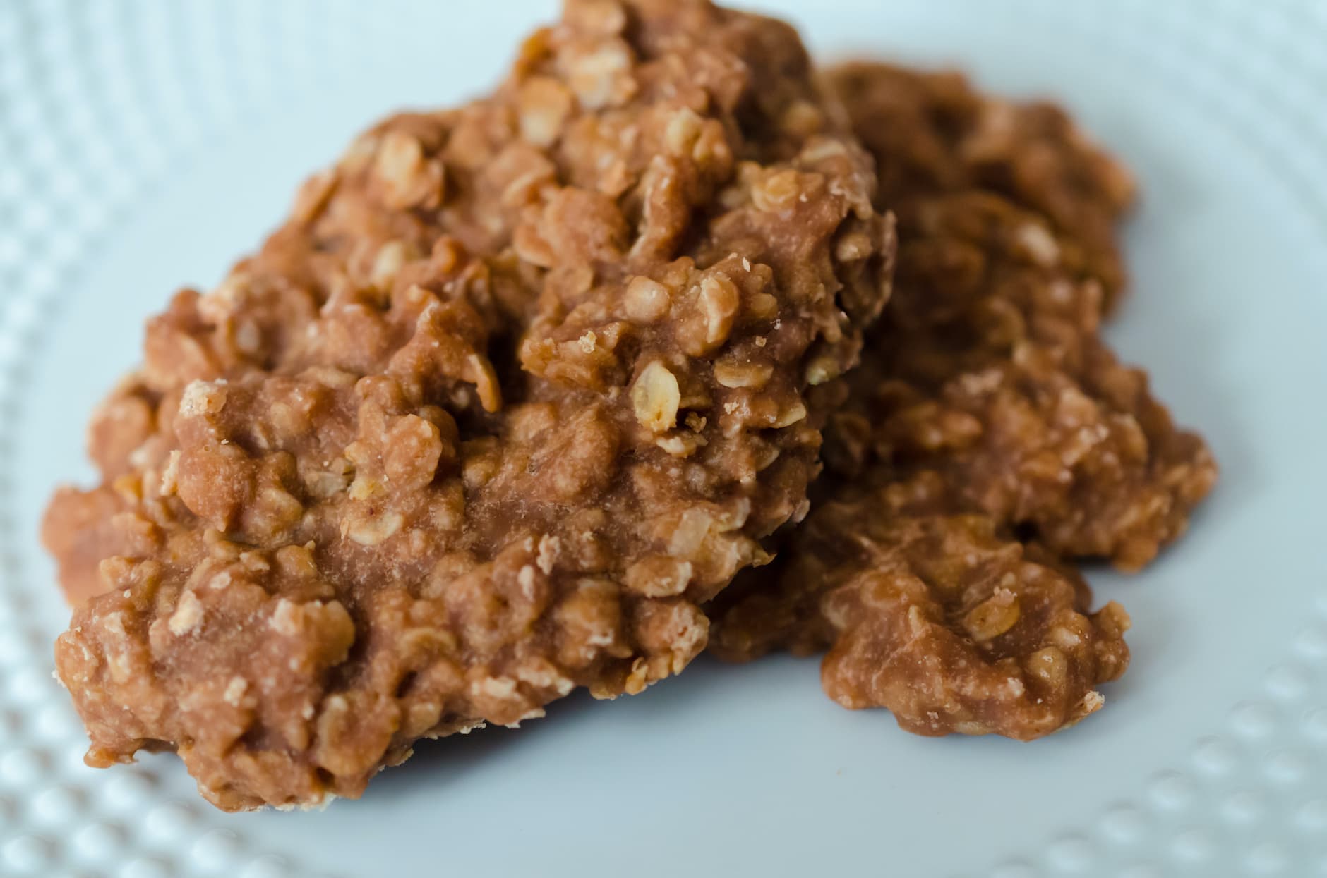 No-bake chocolate cookies cooling on parchment paper