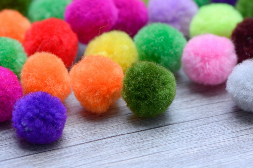 A colorful Pom Pom with white background