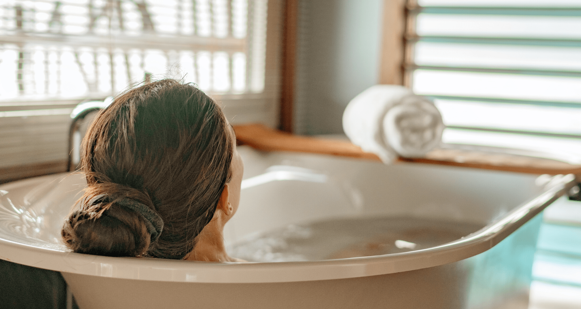 woman soaking in a bath