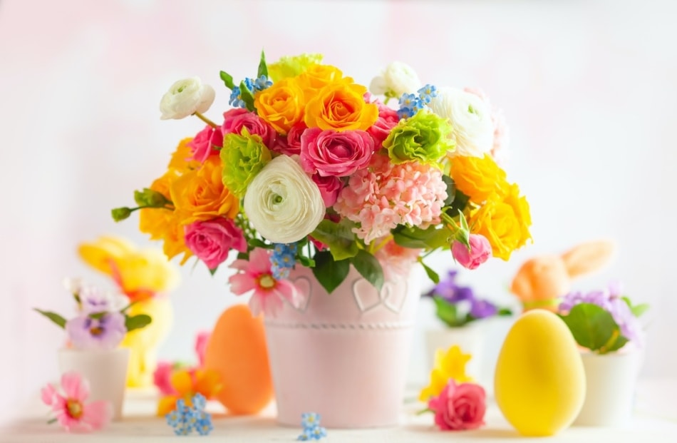 Easter flower bouquet with a yellow Easter Egg.