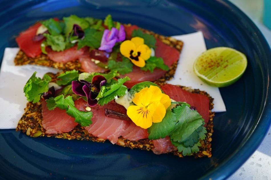 Colorful pansies on food.