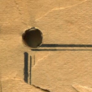 Closeup of hole now added to the Farmers' Almanac.