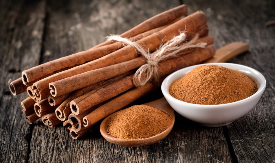 Cinnamon powder on table wooden