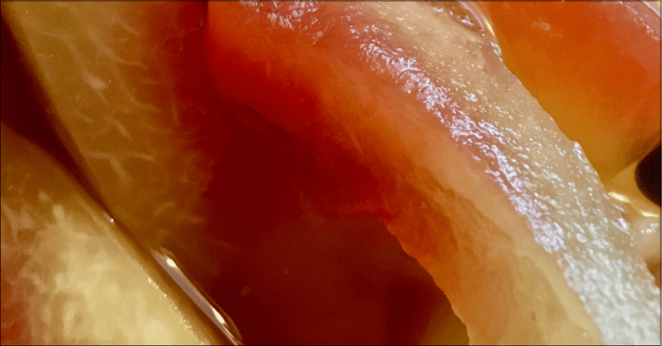 Close up of watermelon pickles or pickled watermelon rind.