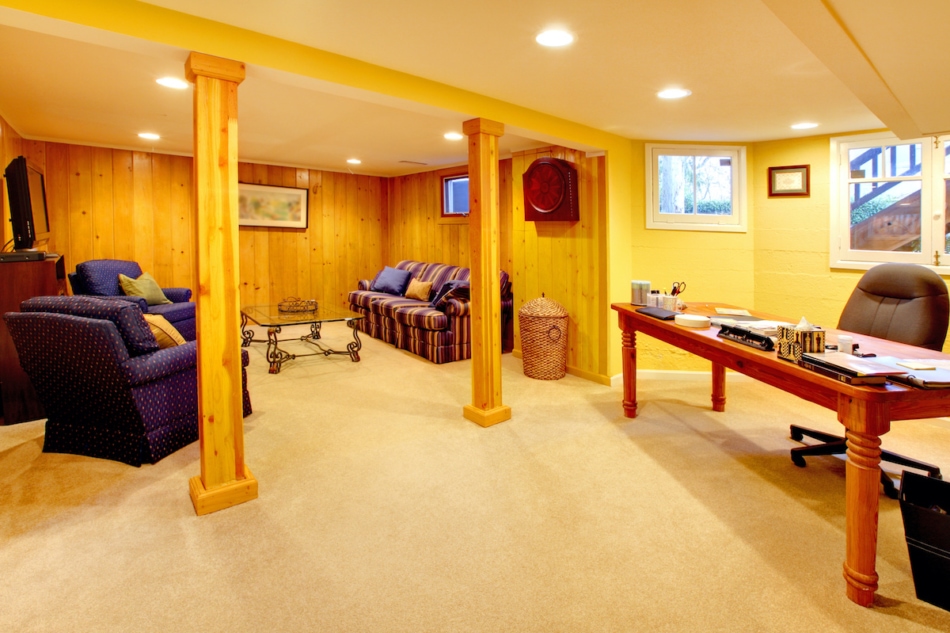 Basement office with desk and chairs