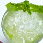 Green summer drink with ice and mint.