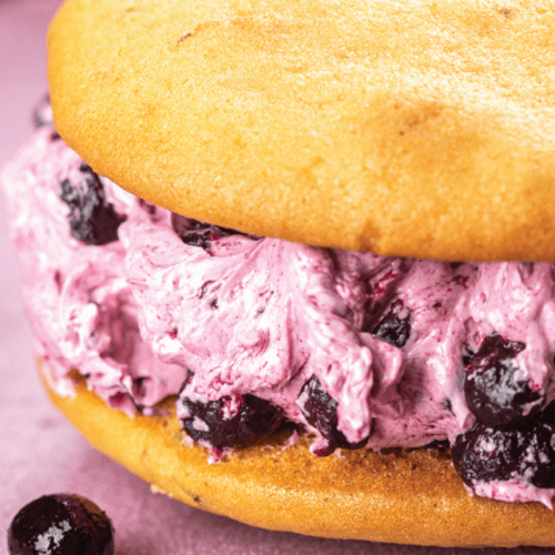 lemon zucchini whoopie pies with blueberry filling.
