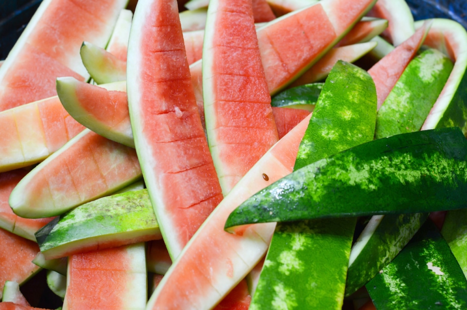 Pile of watermelon rinds with the flesh removed.