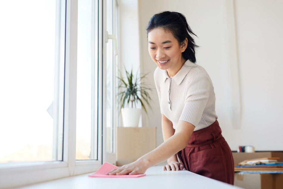 Young woman cleaning