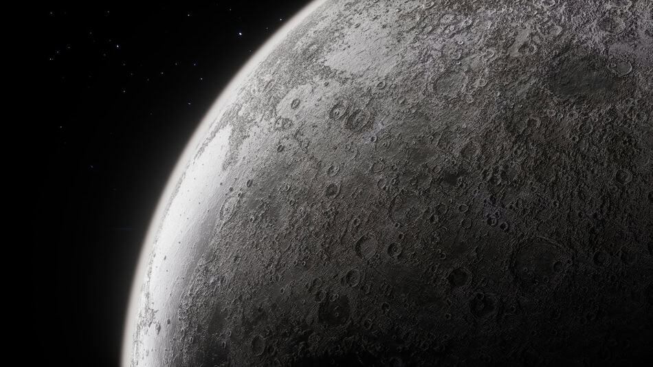Close-up of the moon's surface with craters and shadows at night.