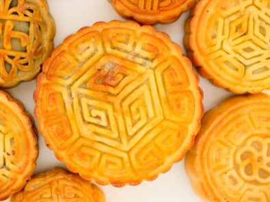 Chinese mooncakes top view arranged on a white plate