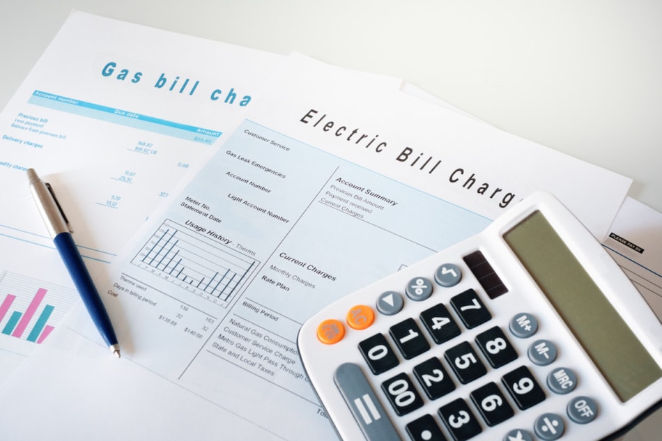 Paperwork including various form and graphs for calculating taxes