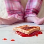 Sandwich fallen to the floor. Murphy's law concept.