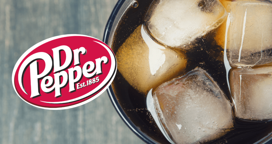 Dr. Pepper soda in a glass with logo.