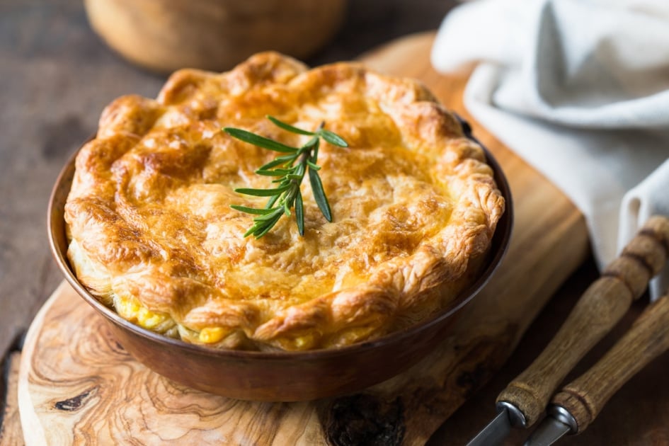 Individual chicken pot pie with puff pastry crust. top view.