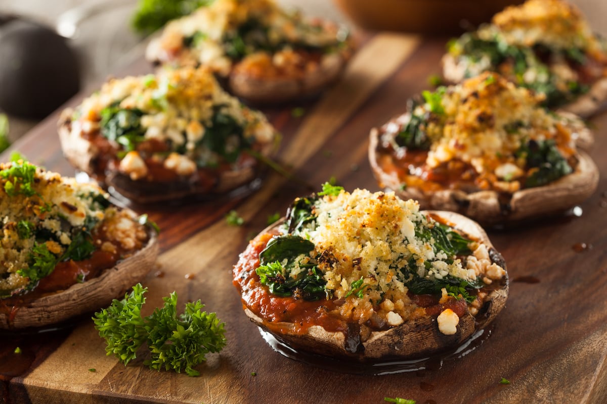 Homemade baked stuffed portobello mushrooms with spinach and cheese