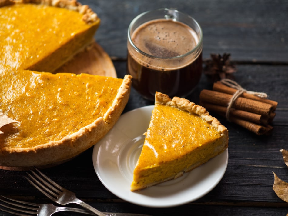 Vegan thanksgiving pumpkin pie and coffee mug.