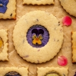 Flower cookies with pressed pansies.