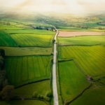 An arial shot of farmland divided into different plots.