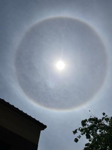 What is the source and the meaning of a large halo around the sun