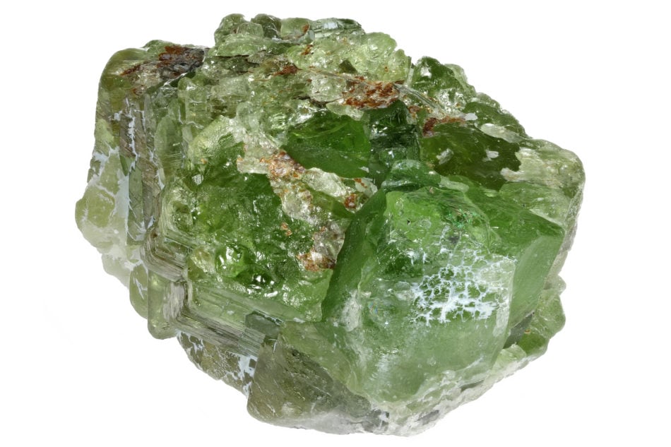 An image of August birthstone peridot in raw form, olivine.