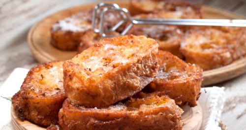 Delicious looking french toast in a dish.