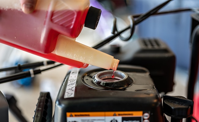 Using fuel stabilizer to winterize lawn mower.