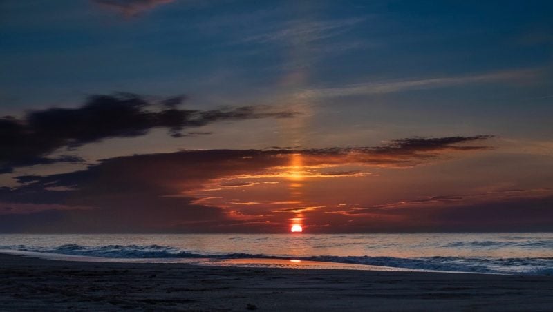 A beam of light forming a sun pillar.