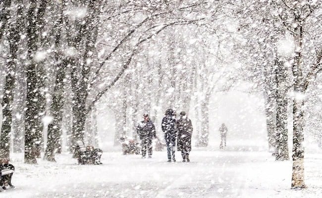 Lake effect snow covering a town near the Great Lakes.