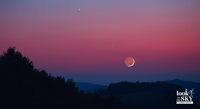 February sky with a crescent Moon and visible planet Saturn.